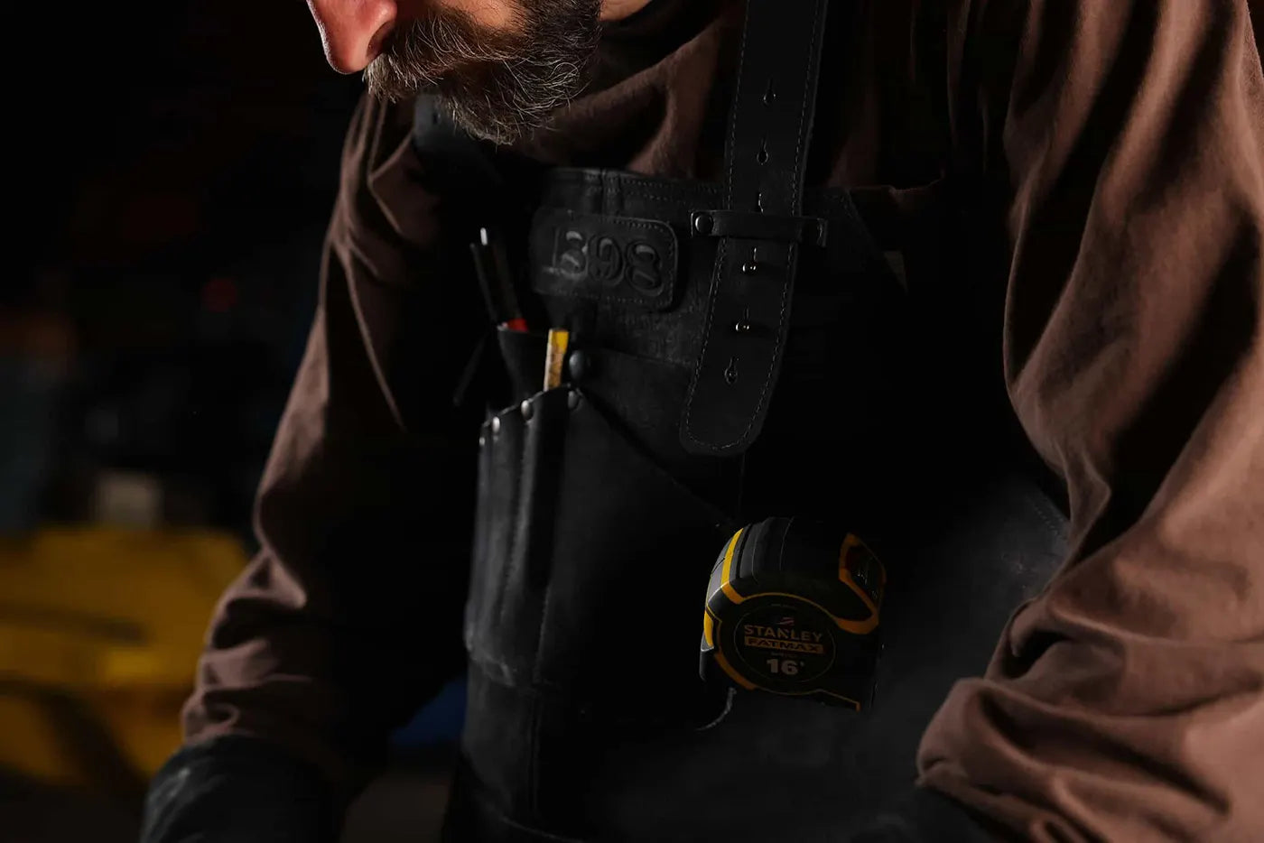 Male model wearing 1898 Leather welding apron with black thread heavy duty, durable apron rated 4.85 stars for professional welding protection and comfort - Black