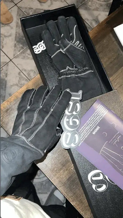 Customer wearing a leather welding gloves with gold stitching, one glove held and the other resting in branded packaging on a wooden surface  showcasing real-world fit, craftsmanship, and presentation Rated 4.60 – Gold

This kind of authentic user-generated content is perfect for building trust. Want to feature it in a “Worn & Reviewed” section or use it as a visual anchor for customer testimonials?
