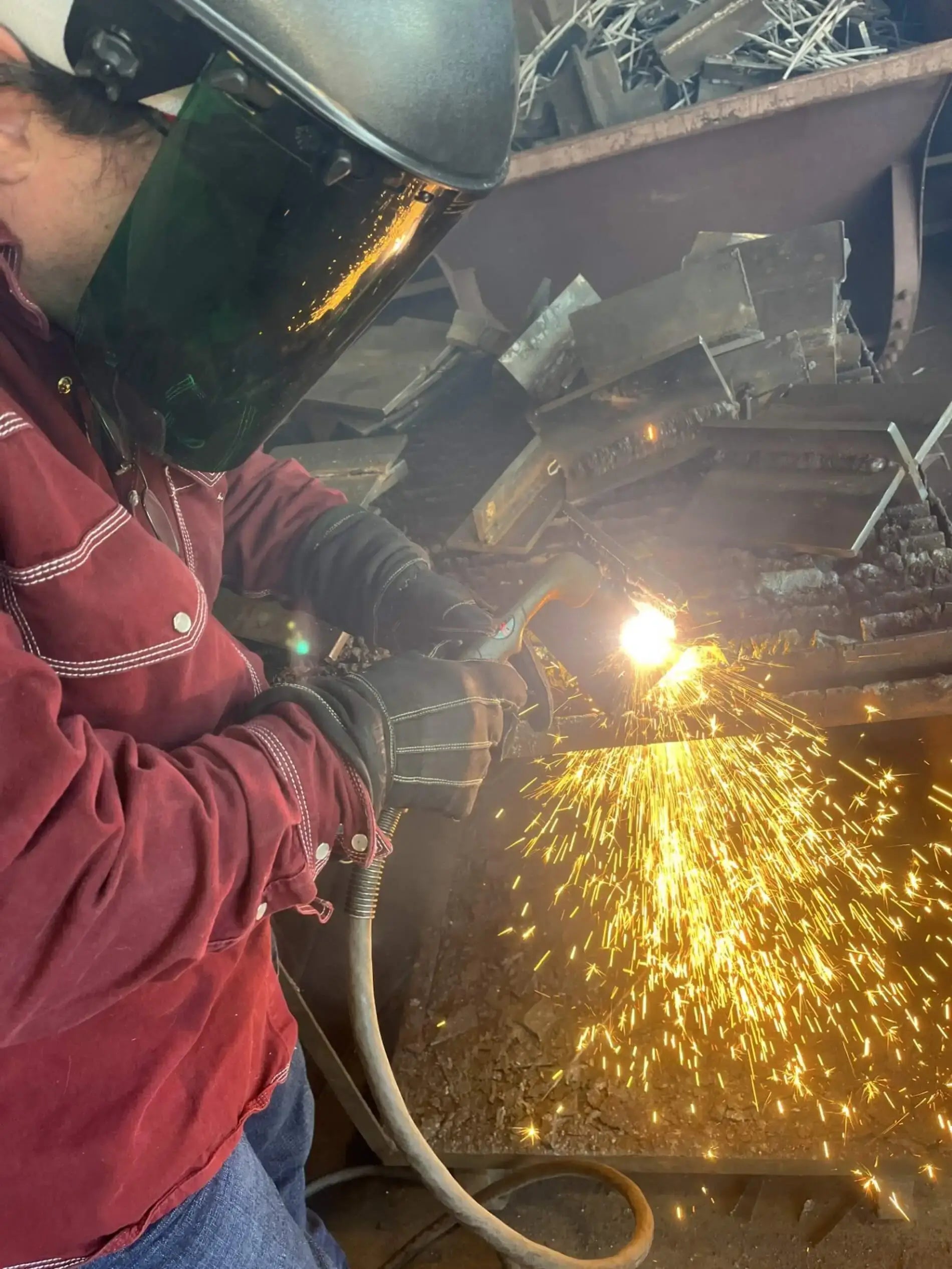 John Foley welding with 1898 Leather gloves, 4.7-star rated for protection and durability